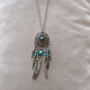 Silver tone and turquoise long necklace. Dream catcher motif.